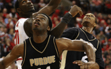 Purdue's Carl Landry (center) and David Teague